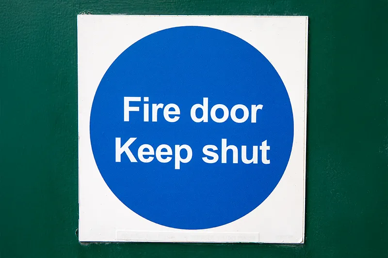 Featured image for “Ensuring compliance: the role of fire door replacements in building safety”